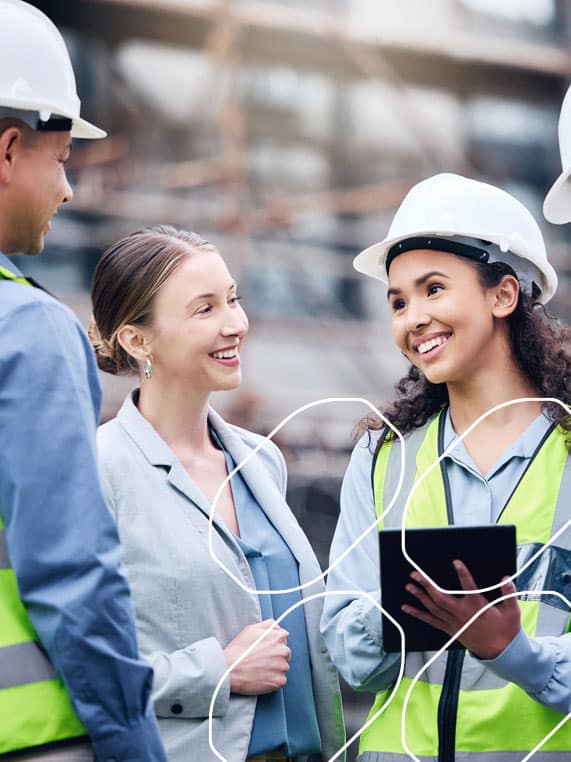 four city workers in a construction site